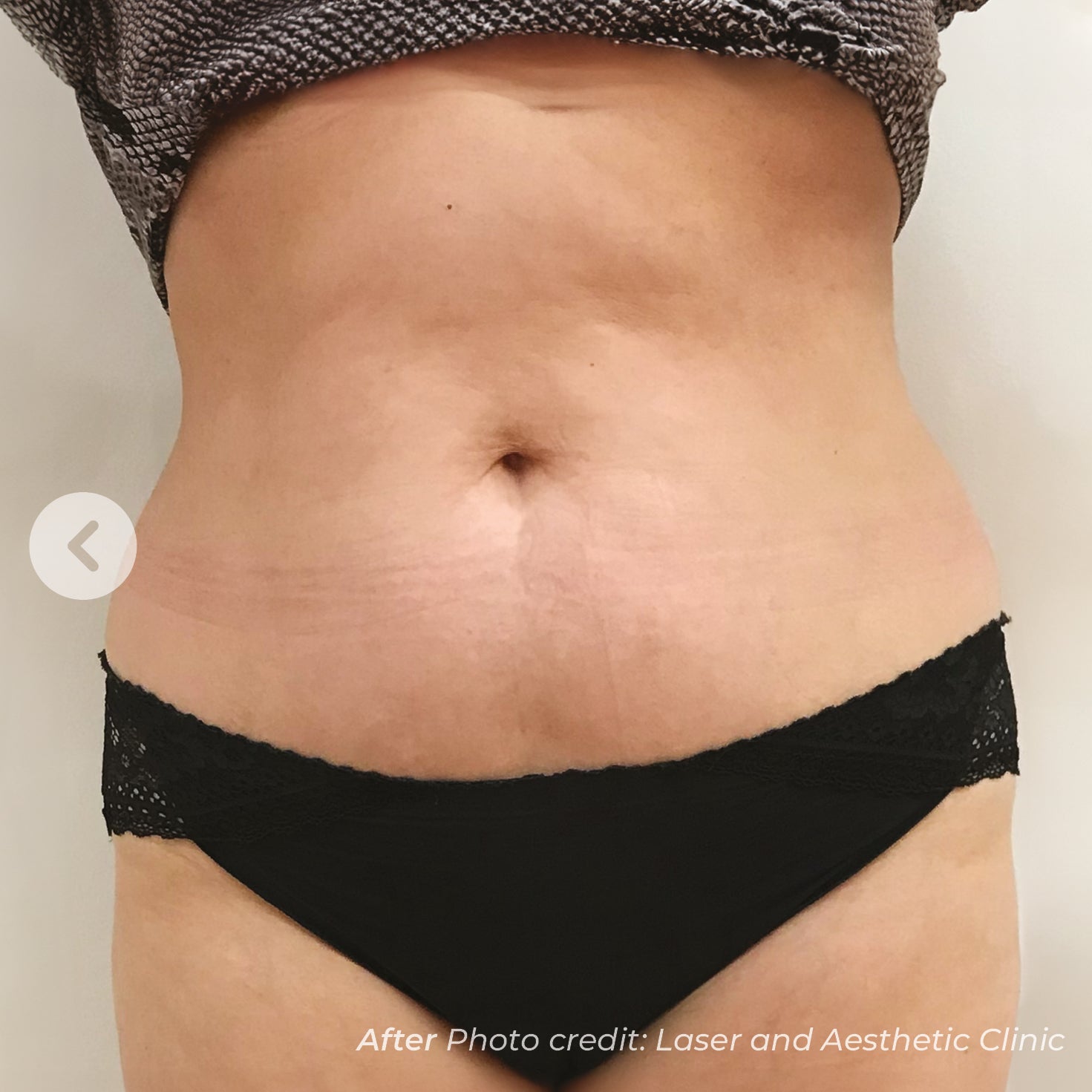 Person wearing black underwear with a neutral background
